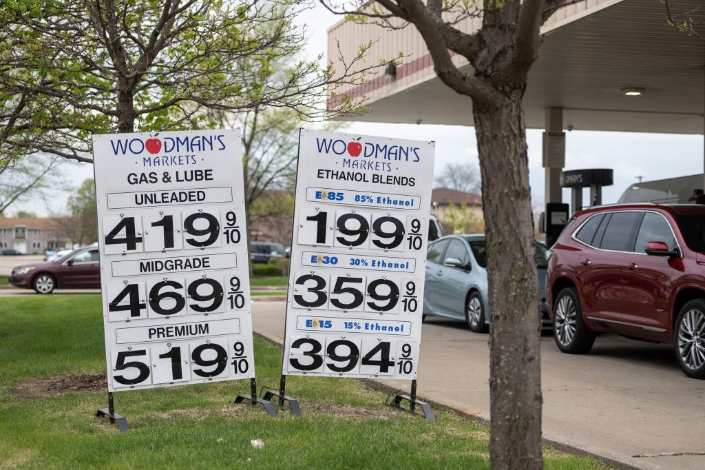 Prices are posted for gasoline Thursday, April 30, 2026, at Woodman’s in Janesville, Wis. Angela Major/WPR