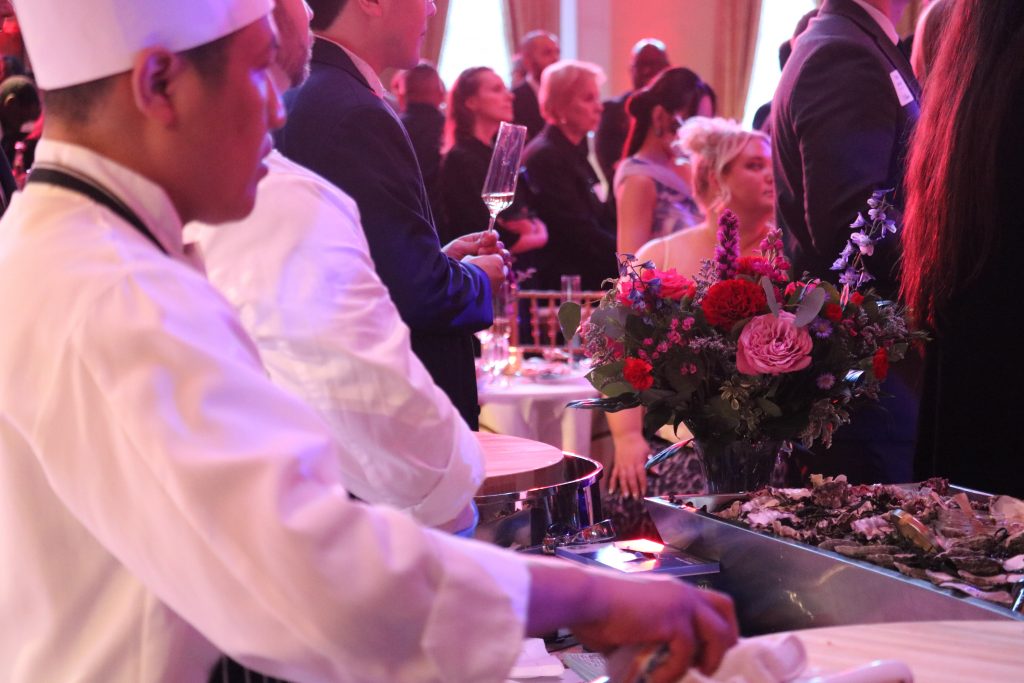 Chefs serve seafood during an after-party celebrating a new, Great Lakes edition of the prestigous Michelin Guide. Photo taken April 8, 2026 by Sophie Bolich.