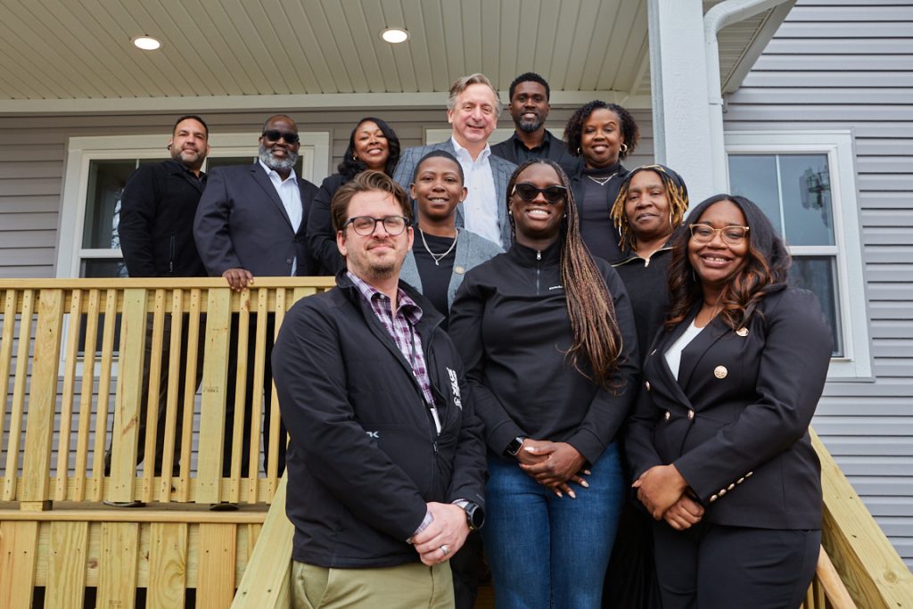 Orlando Acevedo, Construction Manager, Milwaukee Community Crossroads; Al Smith, Chief Operating Officer, Milwaukee Habitat for Humanity; Tish Franklin, Assistant Director of Philanthropy Programs, Northwestern Mutual; Michael Emem, President & CEO, Emem Group. Third row: Steve Radke, Vice President of Government & Community Relations and President of the Northwestern Mutual Foundation; Cordella Jones, Resident Collaboration Director, Community Development Alliance. Second row: Amanda Clark, Housing & Outreach Manager, Dominican Center; Elizabeth Brown, President, Amani United. Front row: Jake Weiler, Director of Housing, Milwaukee Community Crossroads; Oby Nwabuzor, Founder & Principal, Envision Growth; Britney Roberson, Executive Director, Dominican Center. Photo by Todd Dacquisto