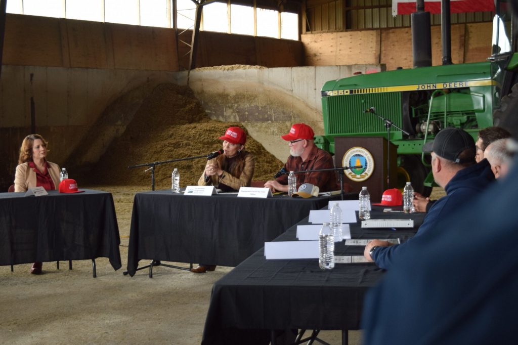 USDA Secretary Brook Rollins, center left, speaks with a group of Wisconsin farmers during visit to the state on Monday, April 27, 2026. Hope Kirwan/WPR