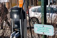 A ChargePoint electric car charging station sits in the parking lot of Jenifer Street Market in Madison, Wis., on Feb. 12, 2022. Jim Malewitz/Wisconsin Watch