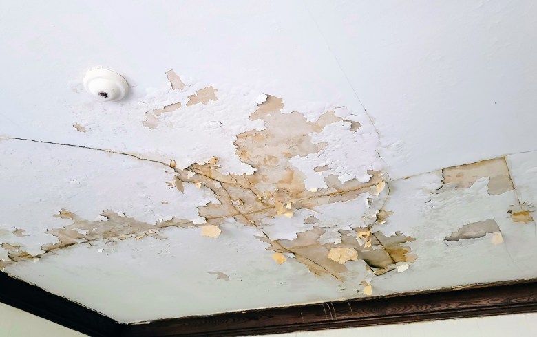 Brooks has had problems with her ceiling for the past three years. The problems came to a head when water started to come into the unit through the light fixtures. (Photo by PrincessSafiya Byers / Milwaukee Neighborhood News Service)