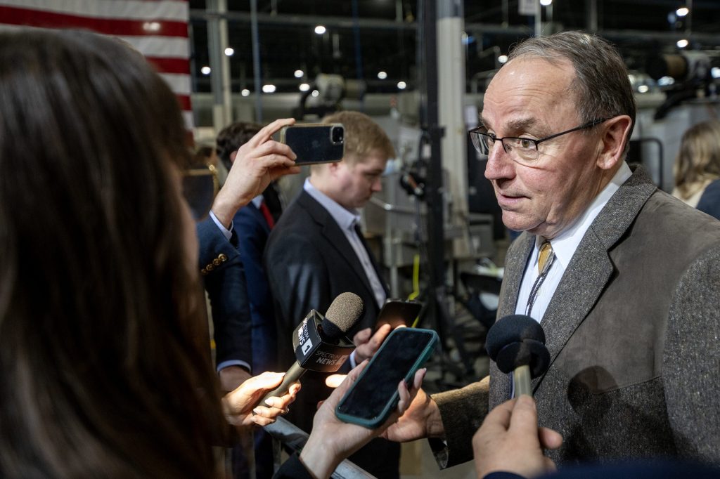 U.S. Rep. Tom Tiffany speaks to reporters Thursday Feb. 26, 2026, at Pointe Precision in Plover, Wis. Angela Major/WPR