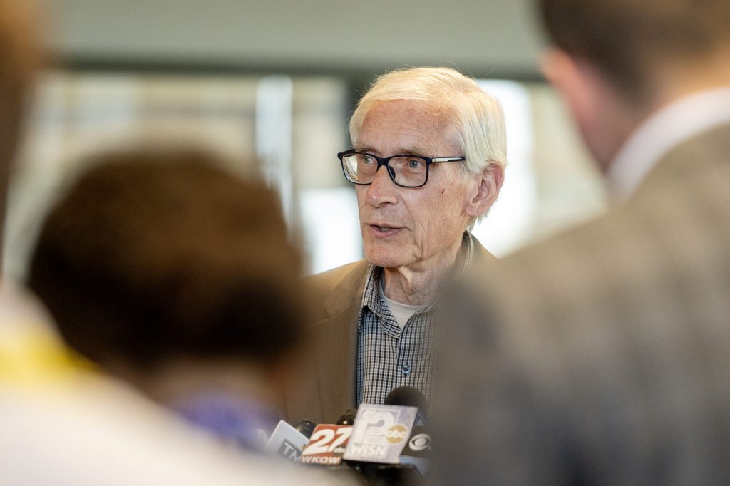 Gov. Tony Evers addresses reporters during a school visit Monday, May 11, 2026, in Barneveld, Wis. Angela Major/WPR