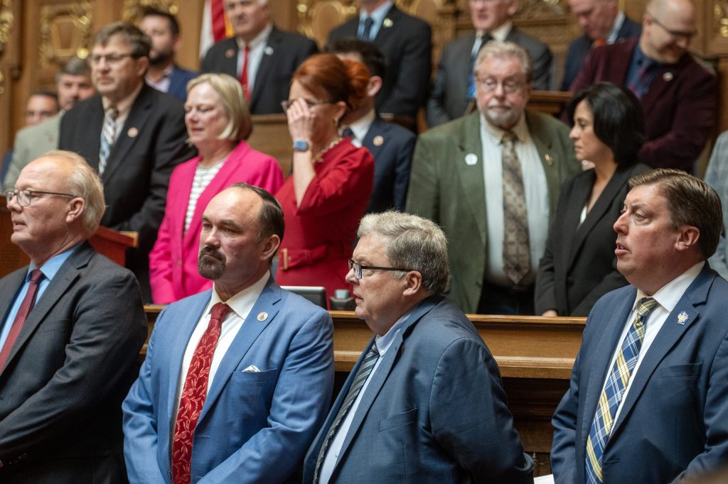 Republican members of the Wisconsin State Assembly stand together before a special session Wednesday, May 13, 2026, at the Wisconsin State Capitol in Madison, Wis. Angela Major/WPR