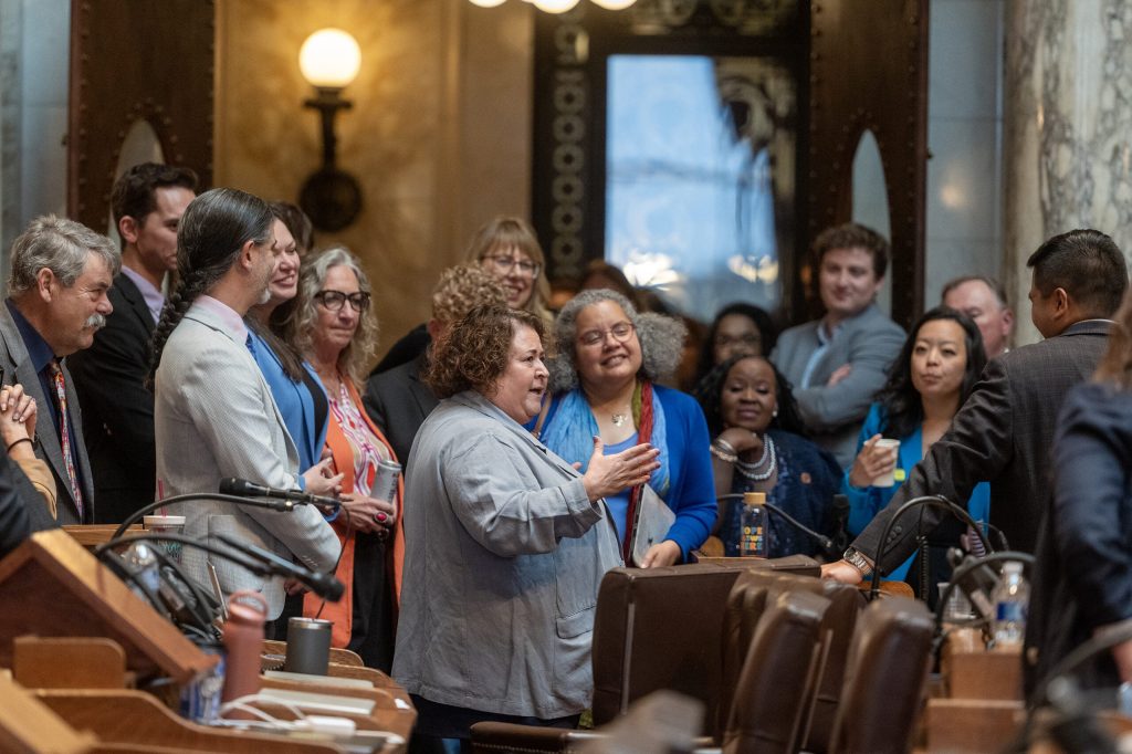 Democratic members of the Wisconsin State Assembly gather around as Rep. Lisa Subeck, center, explains that the Republicans are caucusing Wednesday, May 13, 2026, at the Wisconsin State Capitol in Madison, Wis. Angela Major/WPR
