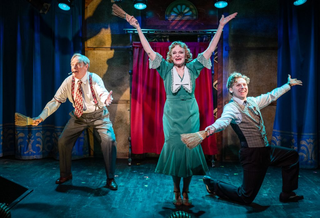 Milwaukee Repertory Theater presents the World Premiere of George & Gracie: A Love Story May 1 – June 4, 2026. Pictured L to R: James Pickering, Tami Workentin, Jonathan Riker. Photo by Michael Brosilow.
