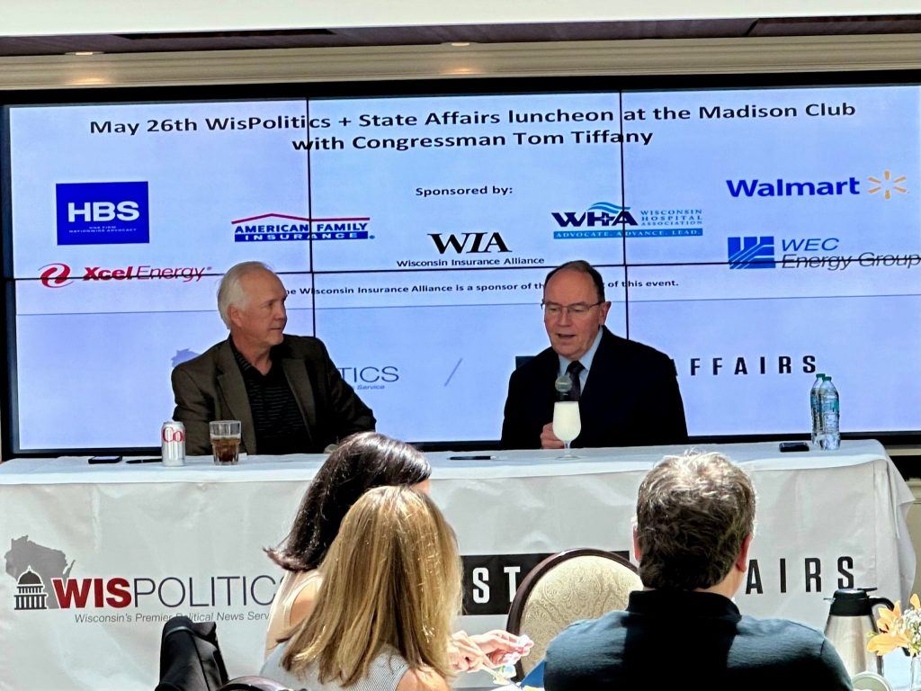 U.S. Represenative and Republican gubernatorial candidate Tom Tiffany, right, speaks during a luncheon event hosted by WisPolitics in Madison, Wis., on May 26, 2026. Anya van Wagtendonk/WPR
