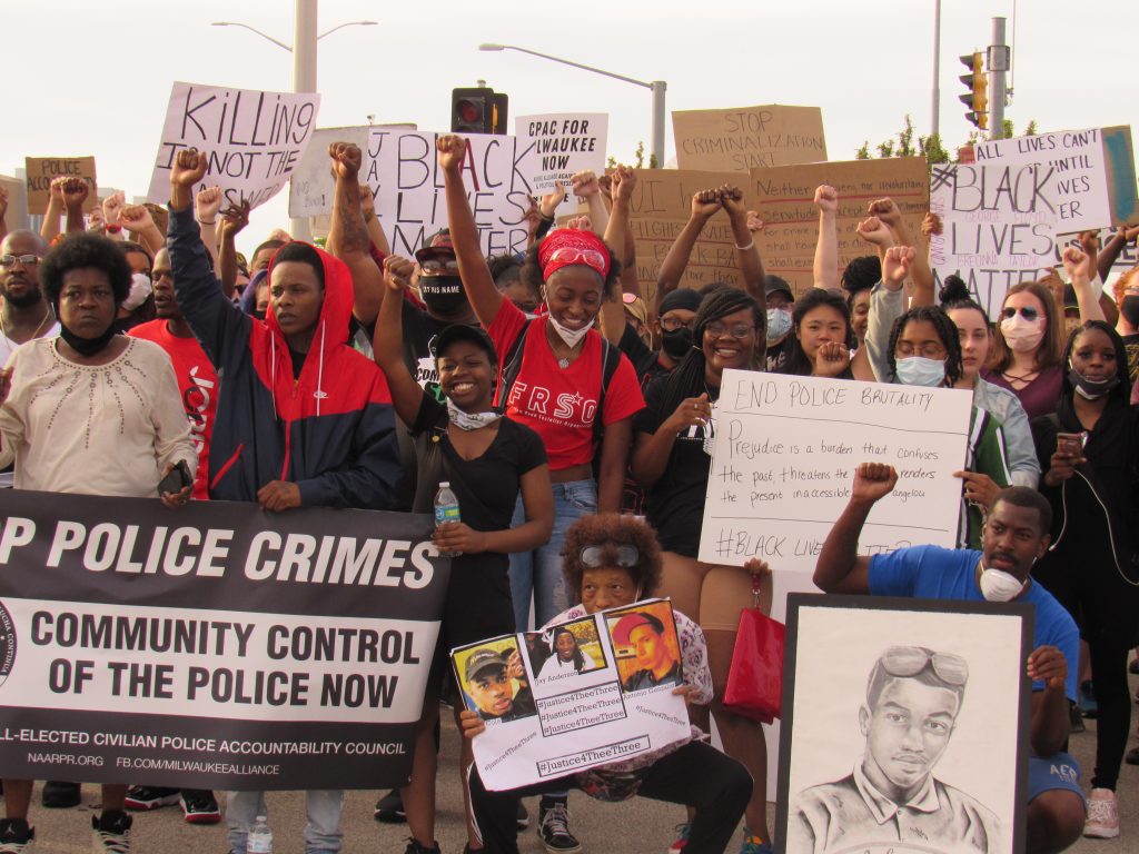 Protesters gather to march in Wauwatosa alongside the families of Antonio Gonzales, Jay Anderson Jr., and Alvin Cole in 2020, all killed by officer Joseph Mensah. (Photo by Isiah Holmes/Wisconsin Examiner)