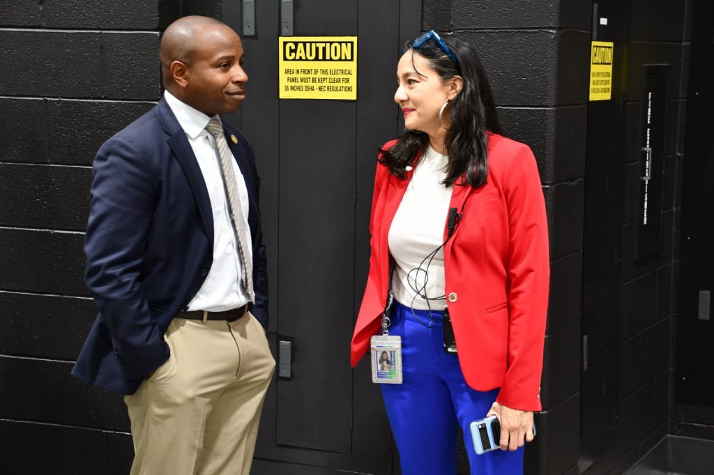Mayor Cavalier Johnson confers with election director Paulina Gutiérrez during a tour of the 2024 election absentee ballot counting process. Photo by Jeramey Jannene.