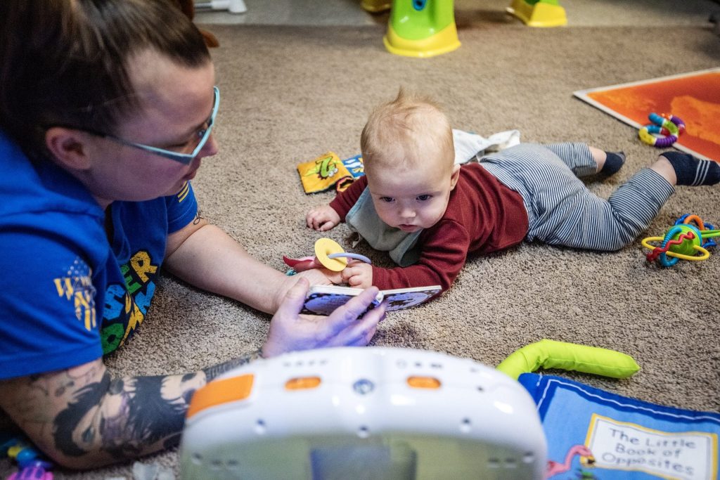 Teacher Michaela Compton works with babies Friday, Oct. 27, 2023, at Wee Care Child Center in Waupun, Wis. Angela Major/WPR