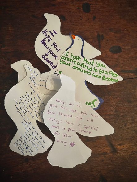 Reflections written by incarcerated mothers participating in the Wisconsin Prison Birth Project. Photo courtesy of the Ostara Initiative