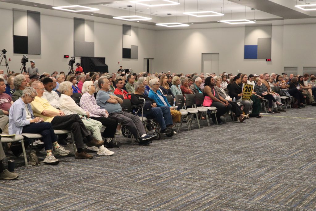 A large crowd turned out to listen to the candidates and speak with them one on one before and after the forum. (Photo by Isiah Holmes/Wisconsin Examiner)