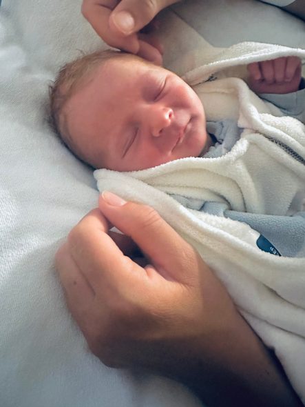 The incarcerated mother featured in this story bonds with her newborn. Photo courtesy of Erica Gerrity