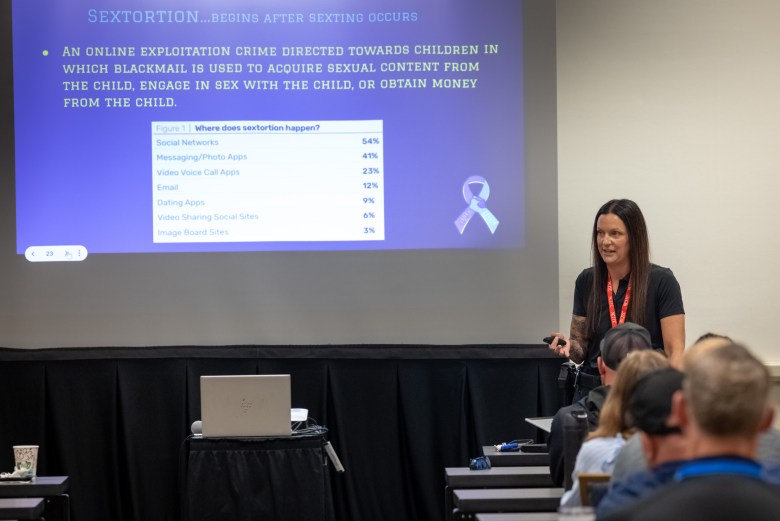 Chief Kassie Dufek of the Oconto Police Department speaks about sextortion during a training conference for school resource officers on June 9, 2026, in Appleton, Wis. Since Landen Weigelt died, Dufek told Wisconsin Watch she’s only seen sextortion cases increase. (Mike Roemer for Wisconsin Watch)