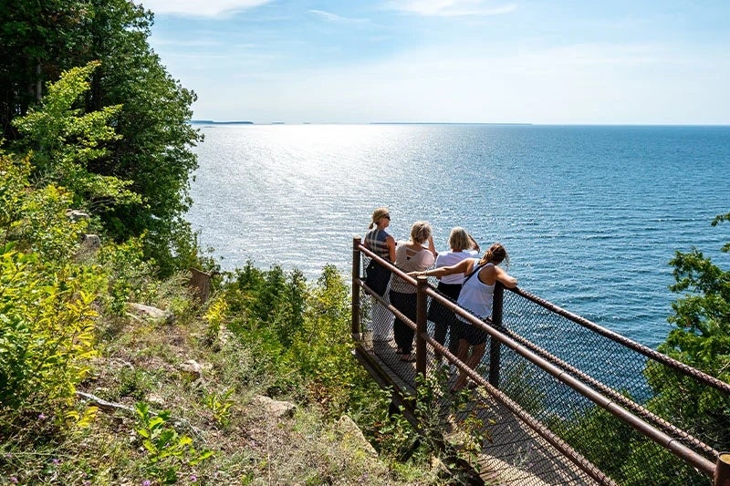 Visitors take in the view at Ellison Bluff in Ellison Bay. Door County saw a 5 percent increase in economic impact from tourism in 2025. Photo courtesy of Destination Door County