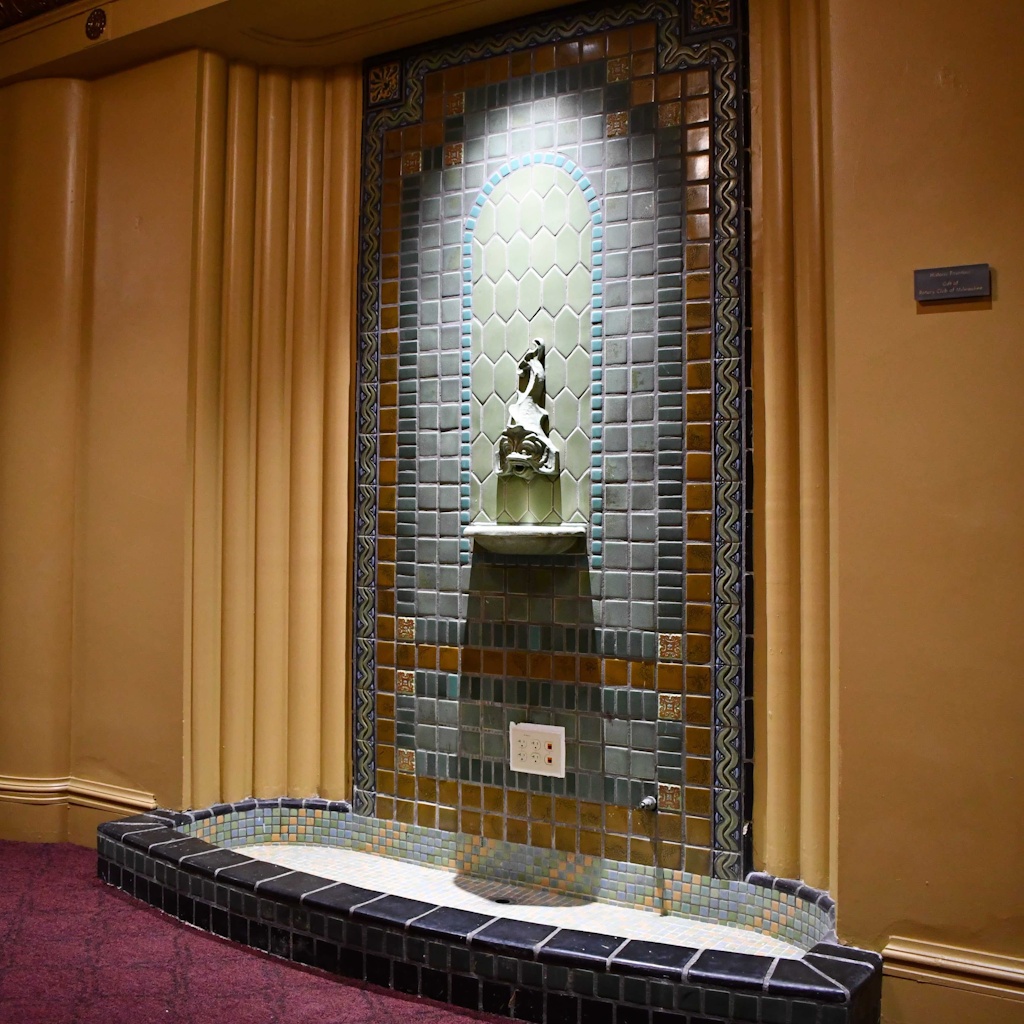 The secluded fountain inside the historic Warner Theater, today known as the Bradley Symphony Center, is one of only a few fountains with tiles from the local Continental Faience & Tile Co., built in 1930. © Ben Tyjeski.