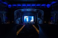 People watch a movie at the Oriental Theatre on Friday, Sept. 22, 2023, in Milwaukee, Wis. Angela Major/WPR