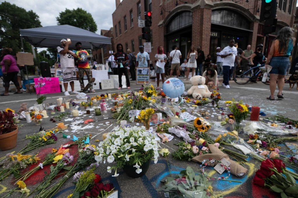 A memorial grows for Corey Ruiz, 38, on July 23, 2026 in Madison, Wis. Ruiz was shot and killed by police on July 22, 2026. Angela Major/WPR