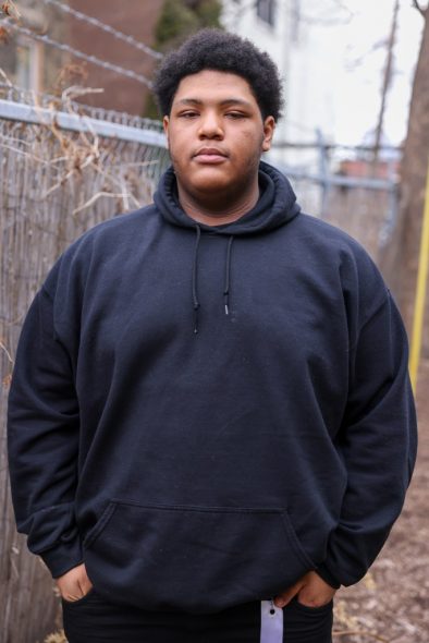 Perry Perkins, a student at Lynde and Harry Bradley Technology and Trade School, was one of five students who said buses to Milwaukee Public Schools are routinely late in the morning. (Photo by Jonathan Aguilar / Milwaukee Neighborhood News Service / CatchLight Local)