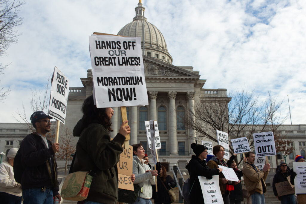 Attendees at a Feb. 12 protest called for a pause on data center construction in Wisconsin. (Henry Redman | Wisconsin Examiner)