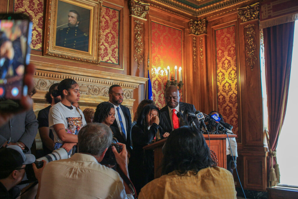 Corey Ruiz's daughter, Kah'liyah, wipes away tears while speaking at a press conference about the police killing of her father. (Photo by Henry Redman/Wisconsin Examiner)