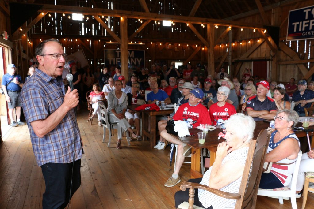 Republican U.S. Rep. Tom Tiffany, who is running for Wisconsin governor, speaks to supporters at his campaign’s “Freedom Fest” event on June 28, 2026 at the Elderberry Manor wedding barn in West Bend, Wis. Rich Kremer/WPR
