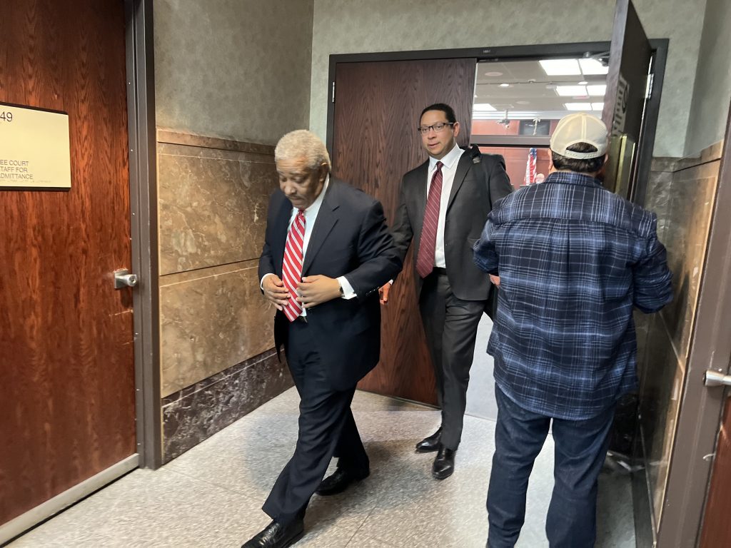 Tearman Spencer exits a courtroom in Feb. 2025. Photo by Jeramey Jannene.