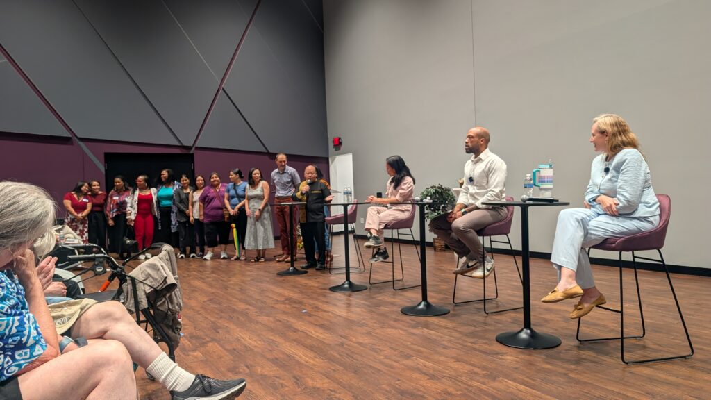 Candidates alongside representatives of Kaleidoscope Wisconsin, a coalition of organizations that are “rooted” in marginalized communities in the state, at the Center for Black Excellence in Madison. (Photo by Baylor Spears/Wisconsin Examiner)