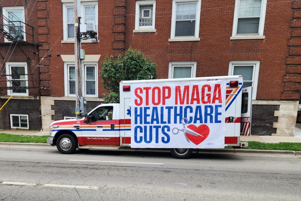 Protesters at the Republican offices in Madison Tuesday had a decommissioned ambulance to display their message opposing healthcare cuts in HR 1. (Photo by Erik Gunn/Wisconsin Examiner)