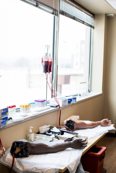 Mannequin arms wait for UW Health staff to practice drawing blood on July 16, 2026, in Madison, Wis. UW Health created a company called WorkForward in May to help health care systems and state agencies build their own apprenticeship programs. (Narayan Mahon for Wisconsin Watch)