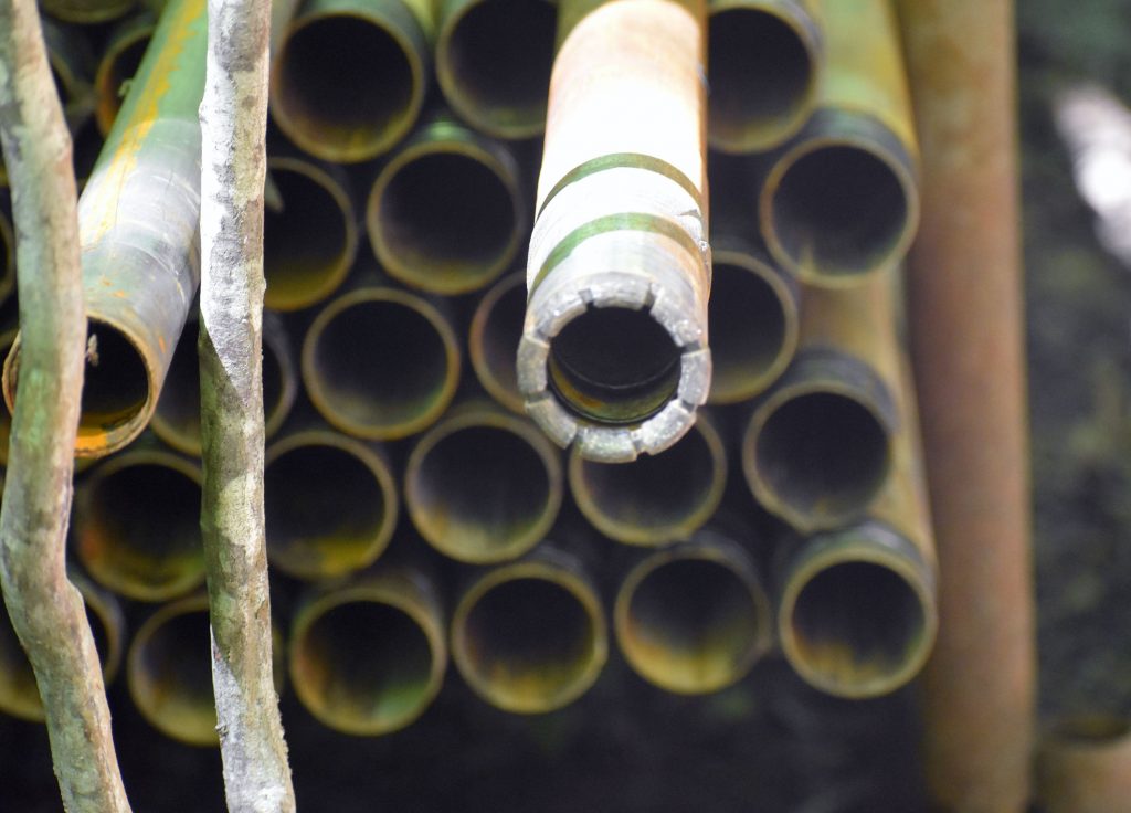 A diamond-core drill bit is used to bore through glacial material and bedrock as Green Light Wisconsin explores the Bend deposit for copper and gold. Danielle Kaeding/WPR