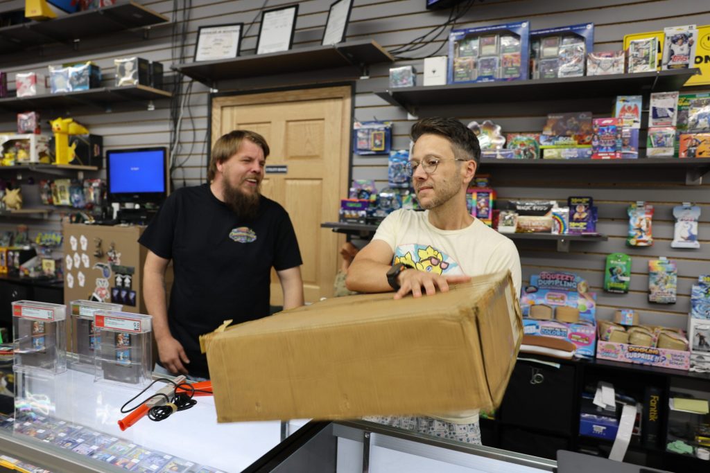 Video game collector Jason Ganos holds the shipping box that held 97 copies of Super Mario Brothers Duck Hunt. The game was discontinued in 1991, but the date on the delivery label was 1993. Elissa Eaton/WPR