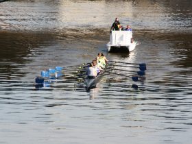 A crew team on the Milwaukee River. Photo by Jeramey Jannene.