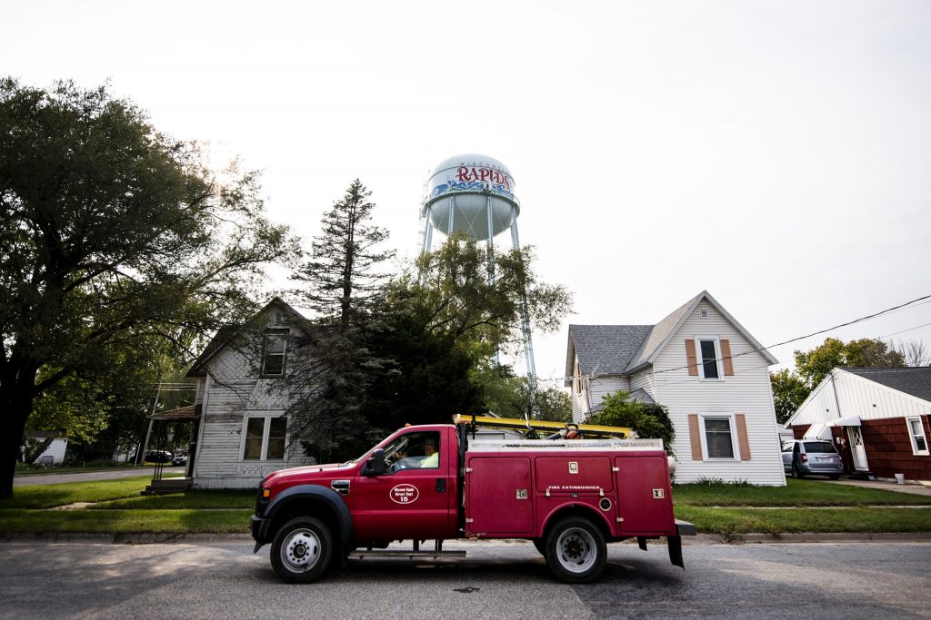 A truck passes through a residential area Monday, Sept. 21, 2020, in Wisconsin Rapids. Angela Major/WPR