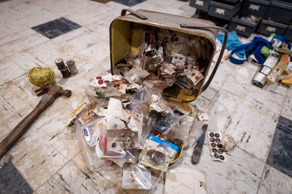 James Moore’s wife’s sewing equipment remains damaged from 2025 flooding Friday, Aug. 17, 2026, in Wauwatosa, Wis. Angela Major/WPR