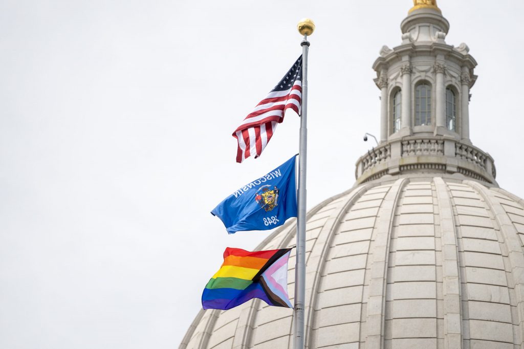 The LGBT Pride flag waves in the wind on the first day of Pride month Monday, June 1, 2026, at the Wisconsin State Capitol in Madison, Wis. Angela Major/WPR