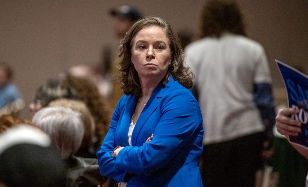 Lt. Gov. Sara Rodriguez stands at the back of the WisDems Convention before beginning her speech as candidate for governor Sunday, June 14, 2026, at the Monona Terrace Community and Convention Center in Madison, Wis. Angela Major/WPR