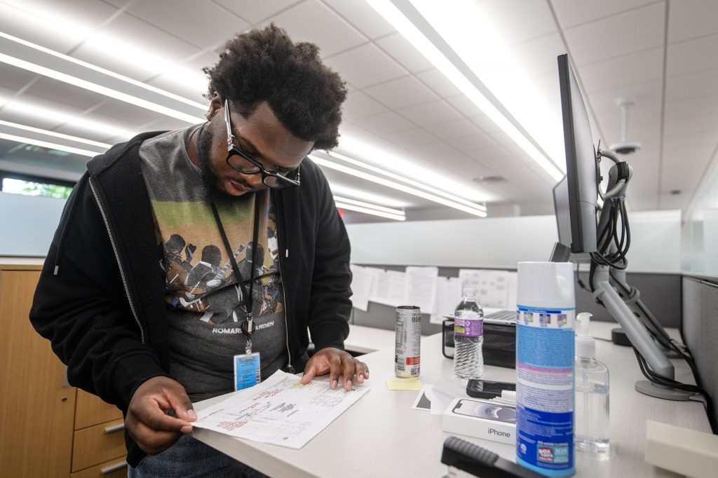 Kashmir Griffin, an apprentice, explains his work Wednesday, Aug. 12, 2026, at We Energies in West Allis, Wis. Angela Major/WPR