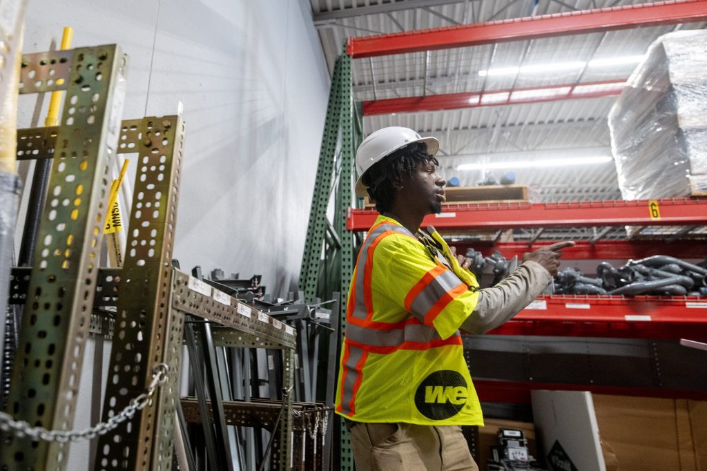 Mickey Critton shows different tools and materials he uses Wednesday, Aug. 12, 2026, at We Energies in West Allis, Wis. Angela Major/WPR