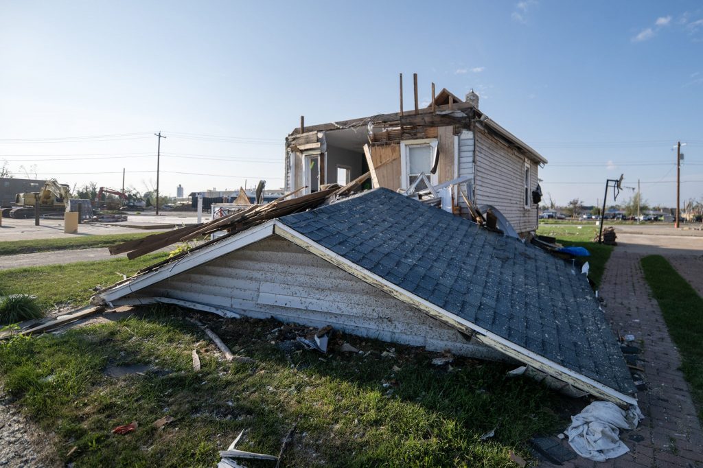 The roof of a home sits on the front lawn due to tornado damage Tuesday, Aug. 25, 2026, in Menasha, Wis. Angela Major/WPR