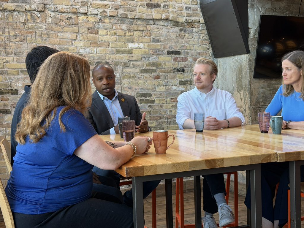 Mayor Cavalier Johnson (center) talks with Democratic leaders. Photo by Jeramey Jannene.