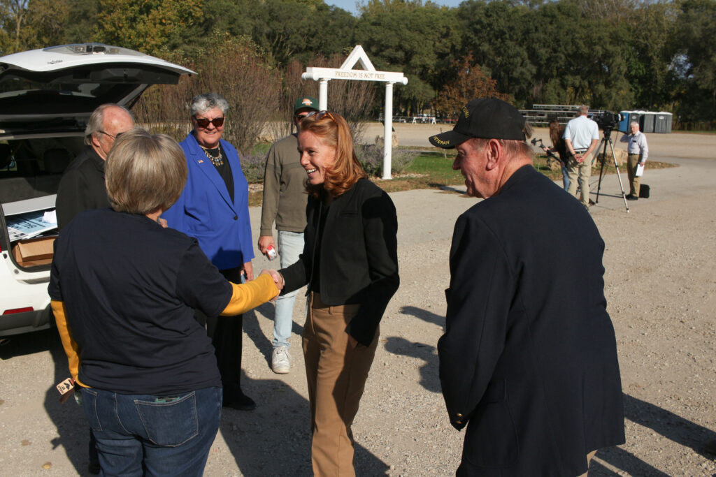 Democratic candidate for the 3rd Congressional District Rebecca Cooke meets with voters. (Henry Redman | Wisconsin Examiner)