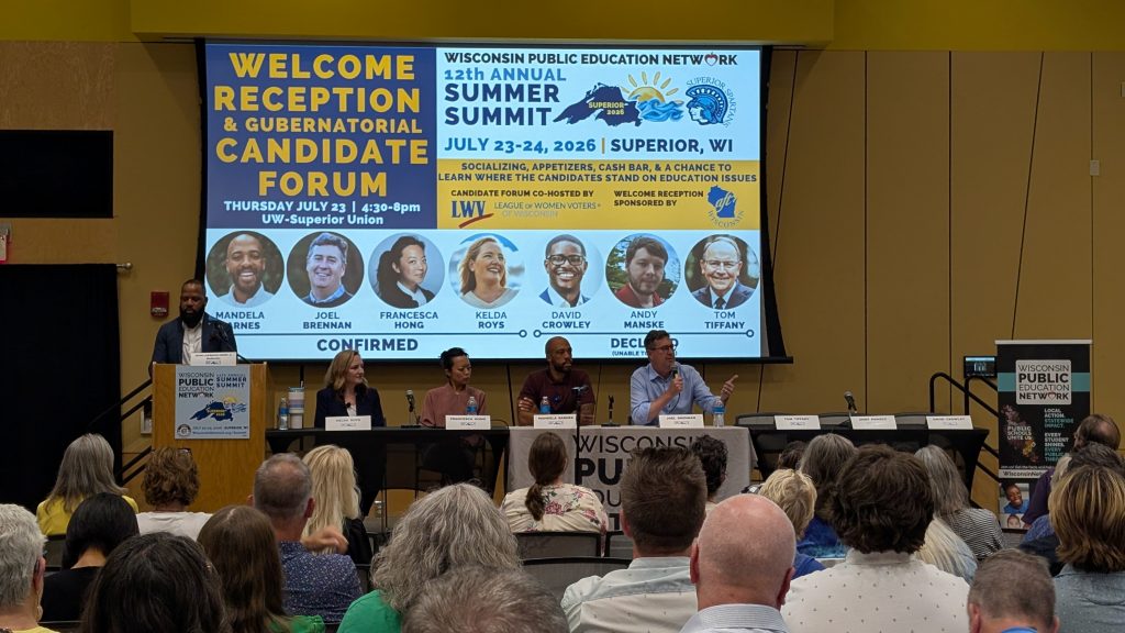 Public education advocates have for years called on the Republican-led Legislature to significantly boost state aid to public schools. Democratic candidates for governor attended the WPEN summit in July. Milwaukee County Executive David Crowley was absent, along with Republican candidates Tom Tiffany and Andy Manske. Summit organizers put place cards by their empty chairs. (Photo by Baylor Spears/Wisconsin Examiner)