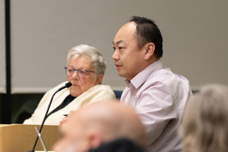 DeForest Village Administrator Bill Chang speaks during a DeForest Village Board meeting at Village Hall in DeForest, Wis., Jan. 20, 2026. (Kayla Wolf for Wisconsin Watch)