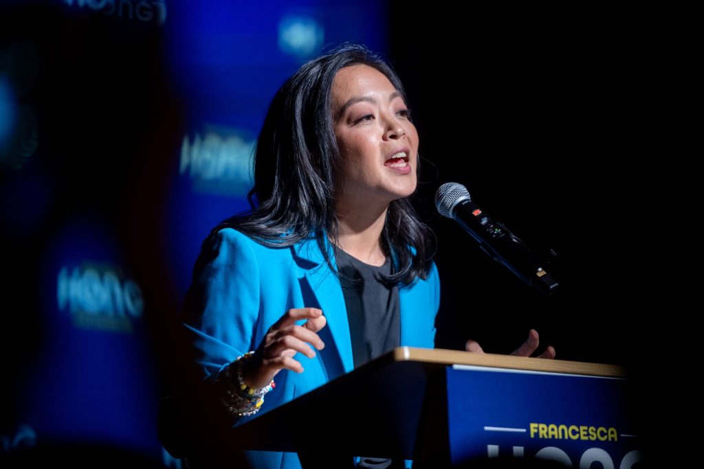 Democratic gubernatorial candidate Francesca Hong addresses the crowd at her election night even on Aug. 11, 2026. Angela Major/WPR