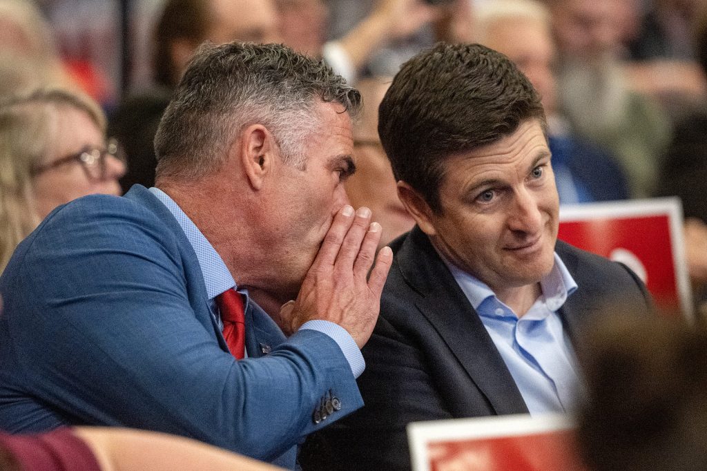 U.S. Rep. Tony Wied, left, and Rep. Bryan Steil, right, sit together Saturday, May 16, 2026, during the Republican Party of Wisconsin State Convention at Kalahari Resorts & Conventions in Baraboo, Wis. Angela Major/WPR