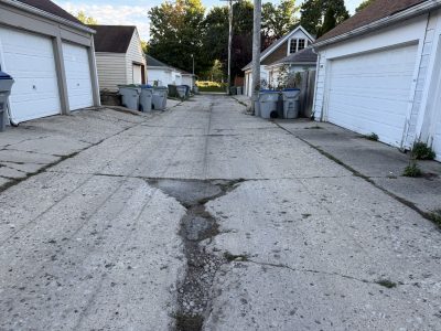 As Residents Fume Over Potholes, City Tries A Different Kind of Fix