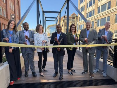 New Plaza Connects Riverwalk, City, Embodies Its Namesake Gary Grunau
