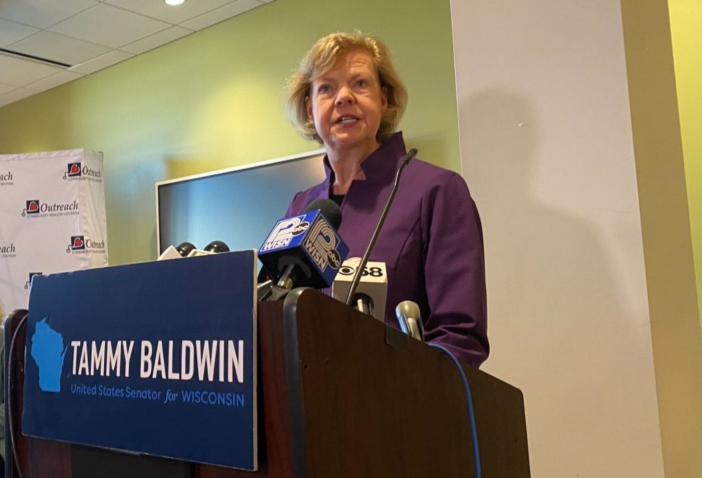 Senator Tammy Baldwin speaks at a press conference on November 12, 2025. Steph Conquest-Ware/WPR